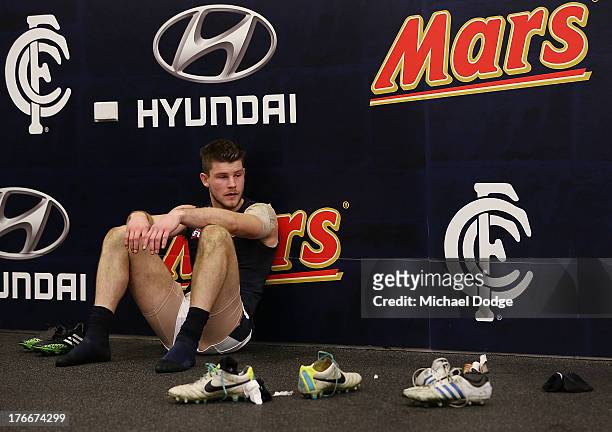 Bryce Gibbs of the Blues sits down after the round 21 AFL match between the Richmond Tigers and the Carlton Blues at Melbourne Cricket Ground on...