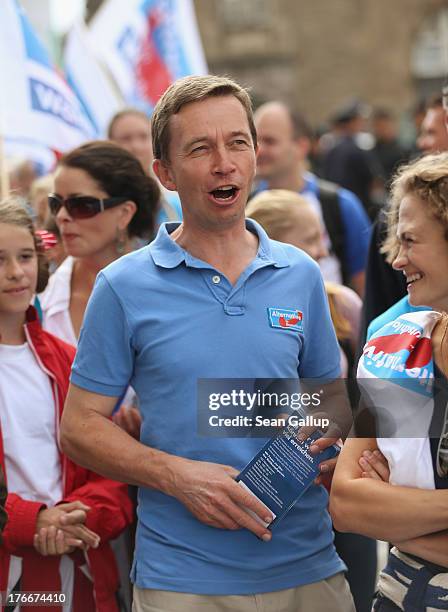 Bernd Lucke, head of the new Euro-skeptic Alternative fuer Deutschland political party, marches with supporters on August 17, 2013 in Hamburg,...