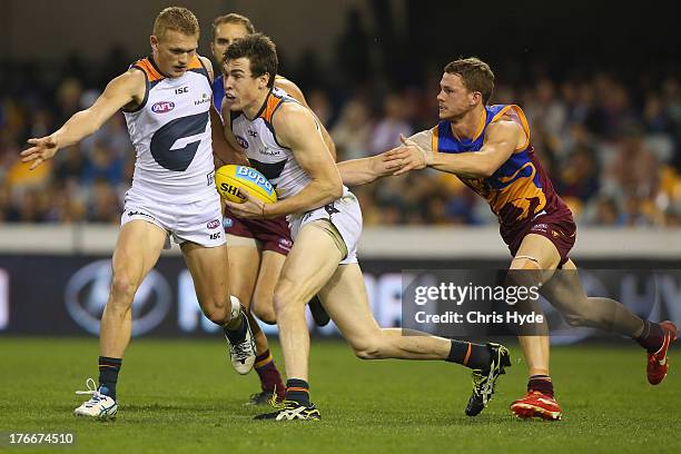 Jeremy Cameron of the Giants runs the ball during the round 21 AFL match between the Brisbane Lions and the Greater Western Sydney Giants at The...