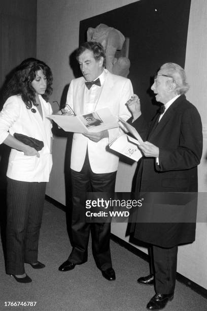 Ann Biderman, Roger Vadim, and Marcel Dalio attend an event at the Los Angeles County Museum of Art in Los Angeles, California, on July 12, 1982.
