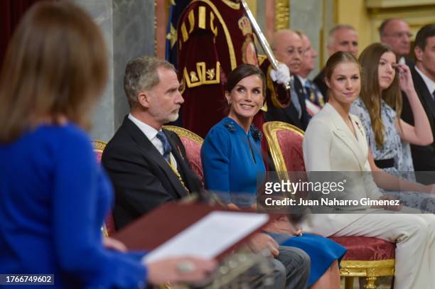 King Felipe VI of Spain, Queen Letizia of Spain, Crown Princess Leonor of Spain and Princess Sofia of Spain listen to President of the Congress of...