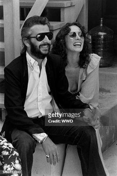 Ringo Starr and Nancy Lee Andrews attend a fashion show at the Beverly Hills home of singer Sammy Davis, Jr. On September 23, 1974.