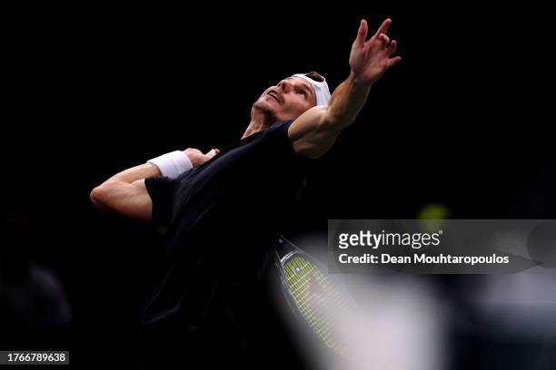 Marton Fucsovics of Hungary serves in his match against Alexander Zverev of Germany during Day Two of the Rolex Paris Masters ATP Masters 1000 at...