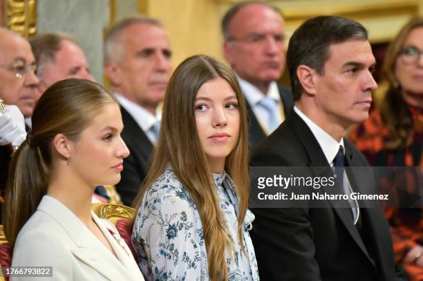 Crown Princess Leonor of Spain, Princess Sofia of Spain and Spanish Prime Minister Pedro Sánchez listen during the ceremony of Crown Princess Leonor...