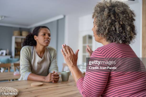 please stop, i don't want your help! - in the dog house stock pictures, royalty-free photos & images