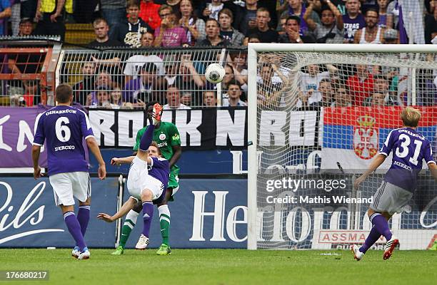 Michael Hohnstedt scores during the Third League match between VfL Osnabrueck and Hansa Rostock at Osnatel Arena on August 17, 2013 in Osnabruck,...