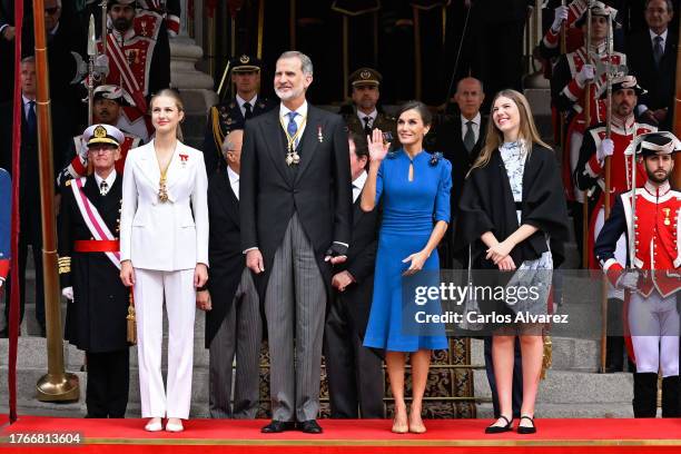Crown Princess Leonor of Spain, King Felipe VI of Spain, Queen Letizia of Spain and Princess Sofia of Spain watch a military parade after the...