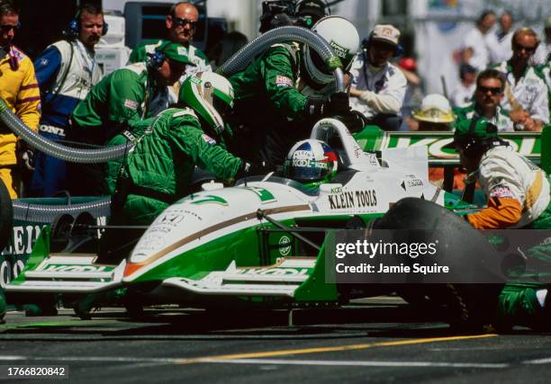 Dario Franchitti from Scotland, driver of the Team KOOL Green Reynard 98i Honda HRK makes a pitstop for refueling and tyres during the Championship...