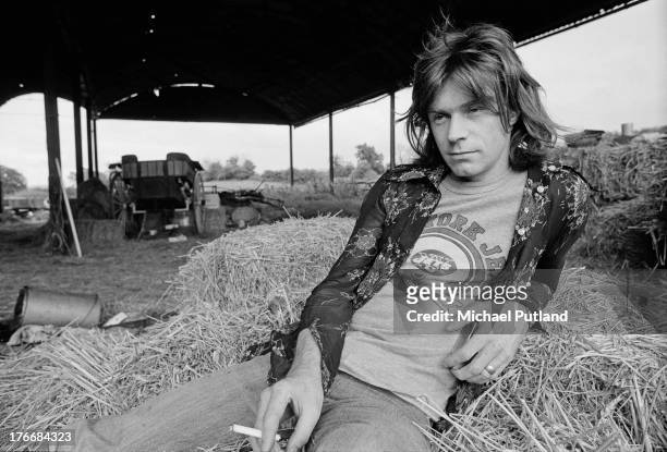 Welsh singer, guitarist and record producer Dave Edmunds in a barn at Rockfield Studios, Monmouthshire, Wales, September 1973.