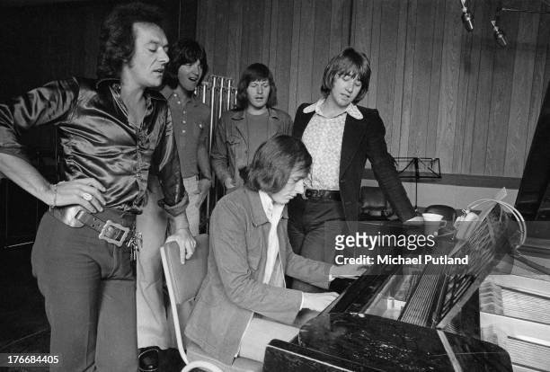 English pop group The Hollies in a recording studio, 1st September 1973. Left to right: singer Allan Clarke, guitarist Terry Sylvester, drummer Bobby...