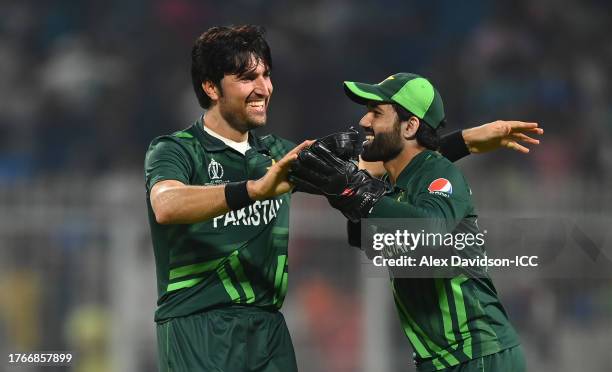 Mohammad Wasim of Pakistan celebrates the wicket of Mustafizur Rahman of Bangladesh with team mate Mohammad Rizwan during the ICC Men's Cricket World...