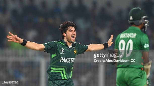 Mohammad Wasim of Pakistan celebrates the wicket of Mustafizur Rahman of Bangladesh during the ICC Men's Cricket World Cup India 2023 between...