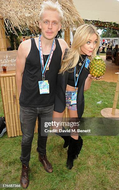 Mr Hudson and Laura Whitmore attend the Mahiki Coconut Backstage Bar during day 1 of V Festival 2013 at Hylands Park on August 17, 2013 in...