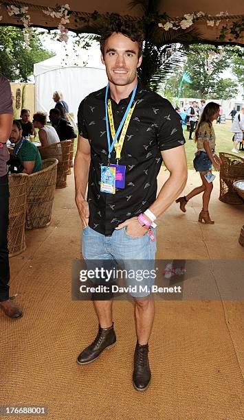 Thom Evans attends the Mahiki Coconut Backstage Bar during day 1 of V Festival 2013 at Hylands Park on August 17, 2013 in Chelmsford, England.