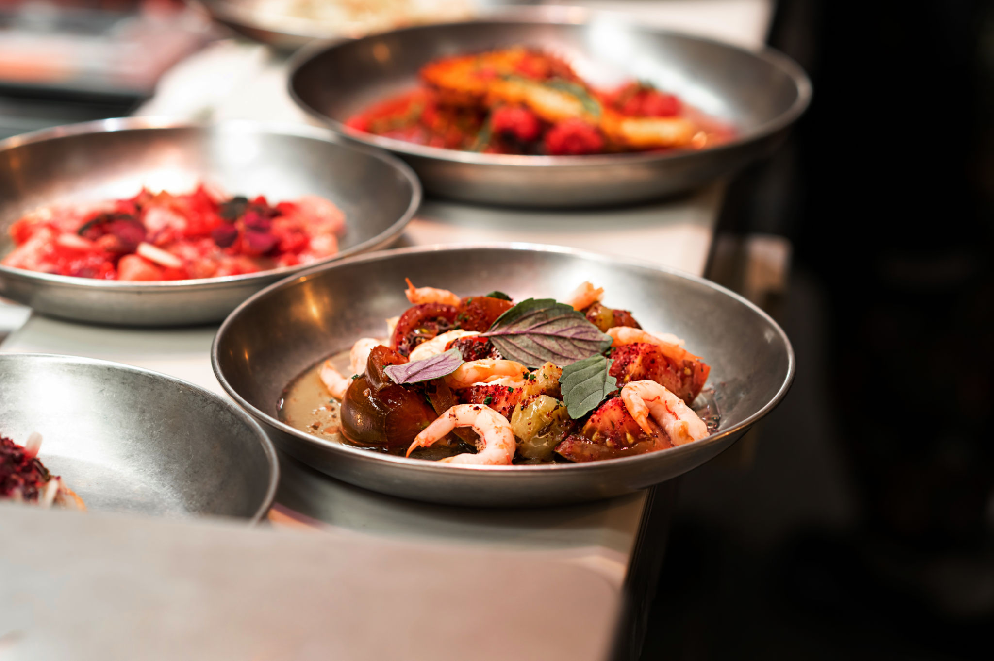 Street food prawn dish, cooked shrimps with vegetables on the table, fast food meal. Street food prawn dish, cooked shrimps with vegetables on the table, fast food meal.