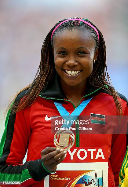 Silver medalist Mercy Cherono of Kenya on the podium during the medal ceremony for the Women's 5000 metres during Day Eight of the 14th IAAF World...