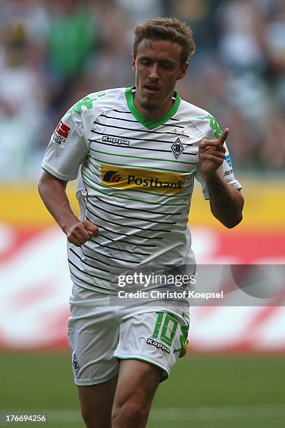 Max Kruse of Moenchengladbach celebrates the first goal during the Bundesliga match between Borussia Moenchengladbach and Hannover 96 at Borussia...