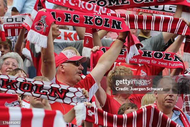 Fans of Cologne support their team at the Second Bundesliga match between 1. FC Koeln and SV Sandhausen on August 17, 2013 in Cologne, Germany.