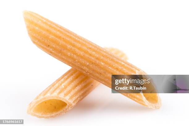 wholegrain penne pasta - vollkorn stock pictures, royalty-free photos & images