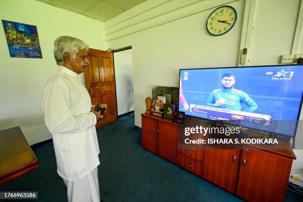 Sri Lanka's former cricket captain and Chairman of a new interim national cricket board Arjuna Ranatunga, watches the 2023 ICC Men's Cricket World...