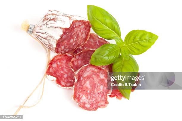 salami sliced on the white background - embutido stock-fotos und bilder