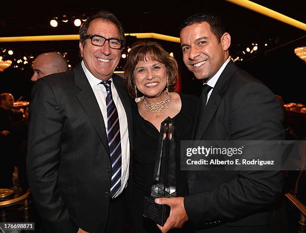 Director Kenny Ortega, Imagen Foundation President & Founder Helen Hernandez, and actor Jon Huertas attend the 28th Annual Imagen Awards at The...