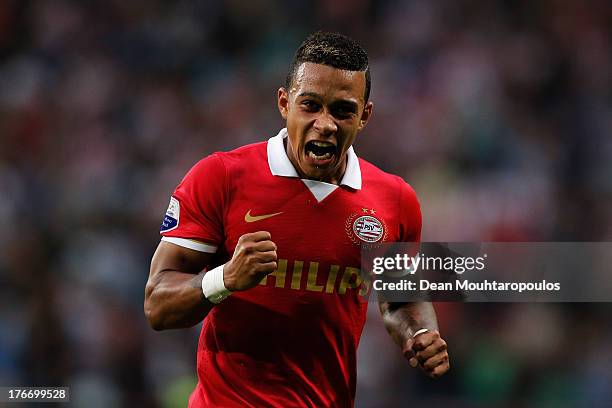 Memphis Depay of PSV celebrates scoring the third goal of the game during the Eredivisie match between PSV Eindhoven and Go Ahead Eagles at Philips...