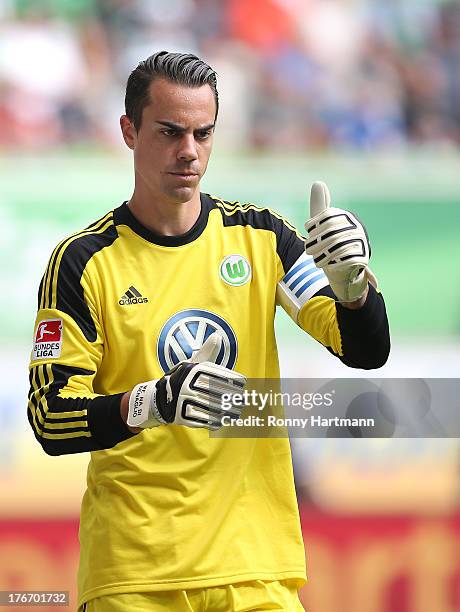 Goalkeeper Diego Benaglio of Wolfsburg gives a thumbs up during the Bundesliga match between VfL Wolfsburg and FC Schalke 04 at Volkswagen Arena on...