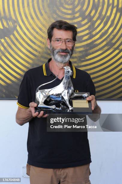 Joaquim Pint poses with the jury special award during the 66th Locarno Film Festival on August 17, 2013 in Locarno, Switzerland.