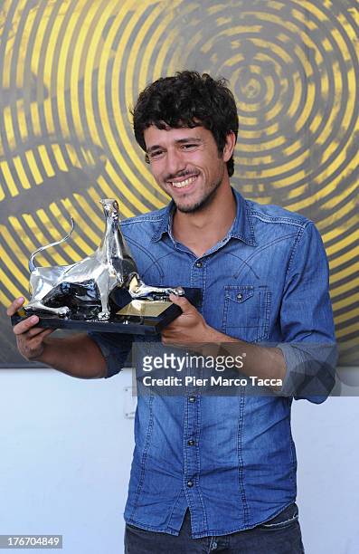 Lois Patiño poses with the best emerging director award during the 66th Locarno Film Festival on August 17, 2013 in Locarno, Switzerland.