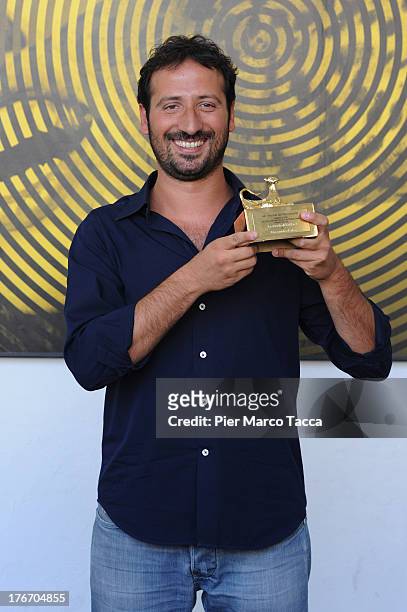 Poses with the Pardino d'oro during the 66th Locarno Film Festival on August 17, 2013 in Locarno, Switzerland.