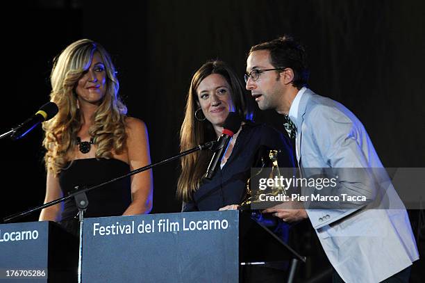 Stephanie Spray and Pacho Velez pose with the Best First Feature award during the 66th Locarno Film Festival on August 17, 2013 in Locarno,...