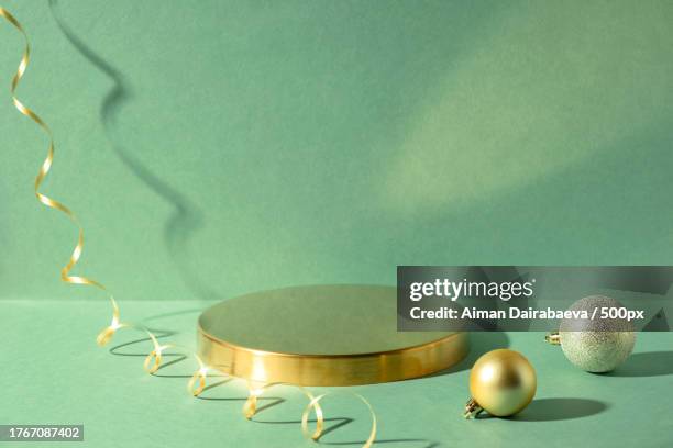 close-up of christmas decoration on table - serpentin bildbanksfoton och bilder
