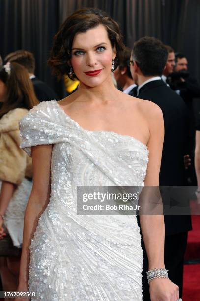 Actress Milla Jovovich arrives for the 84th annual Academy Awards Show, February 26, 2012 in Los Angeles, California.