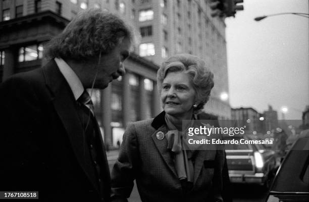 Former US First Lady Betty Ford speaks to an unidentified man as she stands on East 14th Street, New York, New York, October 17, 1979. She had just...
