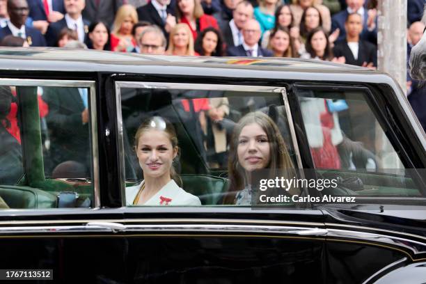 Crown Princess Leonor of Spain and Princess Sofia of Spain leave in a car after the ceremony of Crown Princess Leonor swearing allegiance to the...