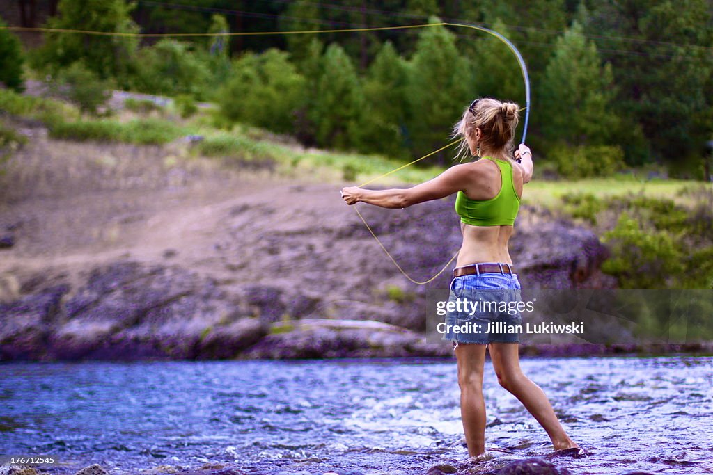 Fly fishing woman