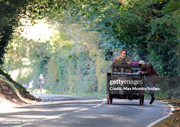 Participants seen driving a 1898 Rochet-Schneider during the annual London to Brighton Veteran Car Run on November 5, 2023 in Staplefield, West...