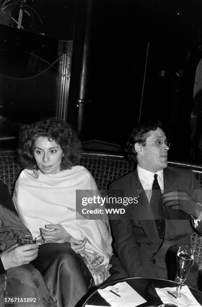 Merel Poloway and Raul Julia attend a party at Club A in New York City on May 22, 1984.