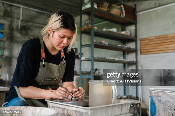 empowering art therapy - women creating pottery ceramics - east asian works of art specialist stock pictures, royalty-free photos & images