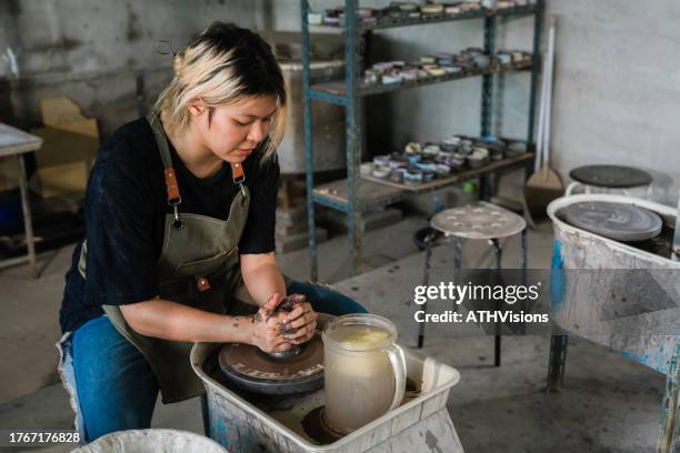 wellbeing and art therapy women learning pottery ceramics - east asian works of art specialist stock pictures, royalty-free photos & images
