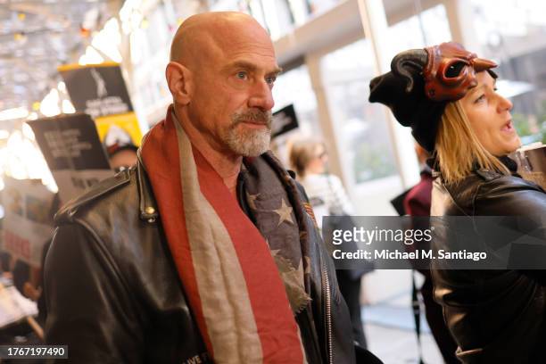 Actor Christopher Meloni joins members of SAG-AFTRA as they participate in a solidarity Screamfest picket outside of the Netflix/Warner Bros....