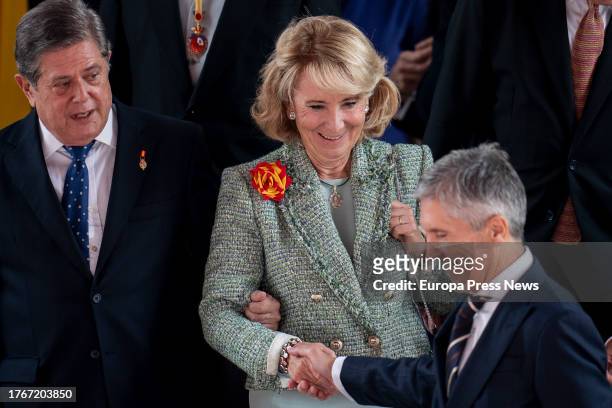 Interior Minister Fernando Grande-Marlaska , greets the former president of the Community of Madrid Esperanza Aguirre, during the act of swearing in...