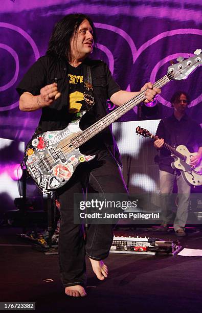 Robby Takac of the Goo Goo Dolls performs at Nikon at Jones Beach Theater on August 17, 2013 in Wantagh, New York.