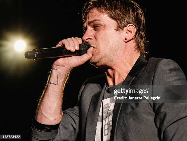 Rob Thomas of Matchbox Twenty performs at Nikon at Jones Beach Theater on August 17, 2013 in Wantagh, New York.