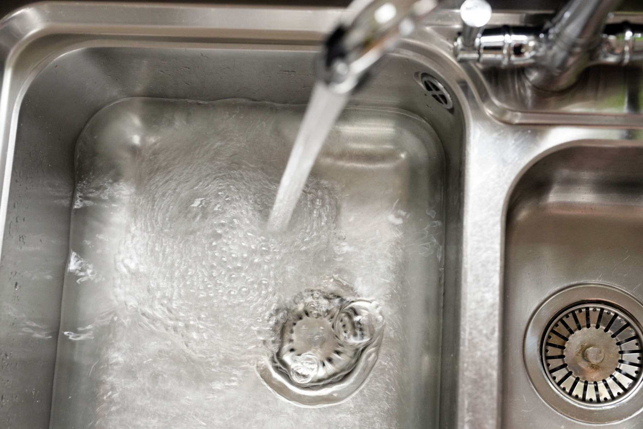 slow drain sinks