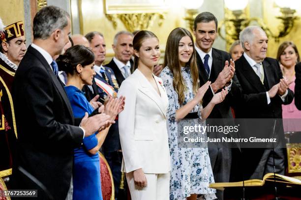 King Felipe VI of Spain, Queen Letizia of Spain, Princess Sofia of Spain, Spanish Prime Minister Pedro Sánchez and other applaude Crown Princess...