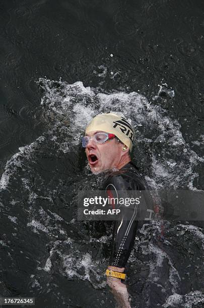 Crown Prince Frederik of Denmark participates in IRONMAN Copenhagen in Copenhagen on August 18, 2013. AFP PHOTO / SCANPIX DENMARK / JENS ASTRUP...