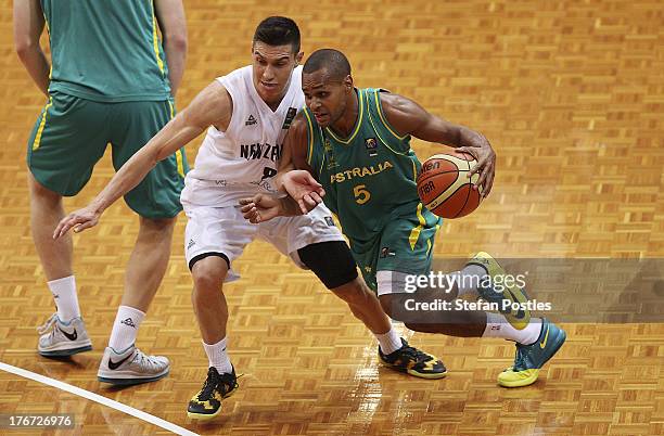 Patty Mills of the Boomers drives to the basket during the Men's FIBA Oceania Championship match between the Australian Boomers and the New Zealand...