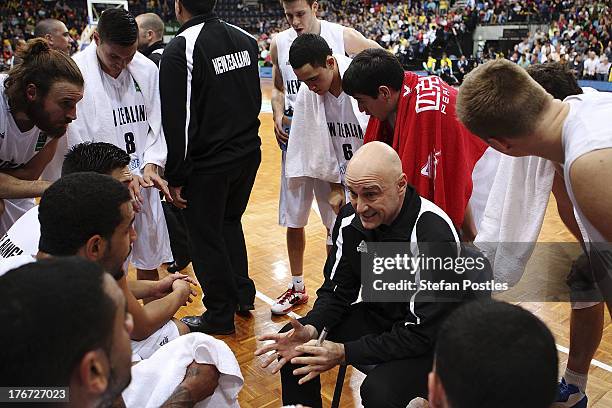 Tall Blacks coach Nenad Vucinic speaks to his players during the Men's FIBA Oceania Championship match between the Australian Boomers and the New...